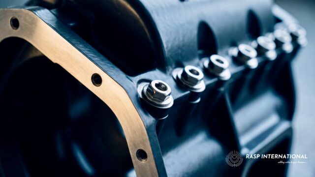 Precision machined industrial component with a bolted flange and stainless fasteners, representing capital goods import under EPCG