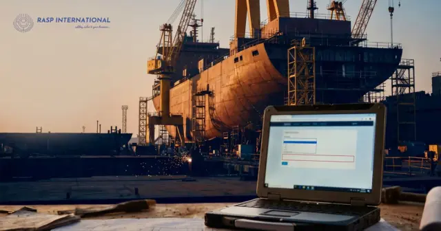 Ship under construction in an Indian shipyard, with a TRACE Intent to Claim form open on a laptop
